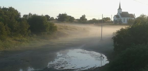 Morgendis over slettene tidlig en sommermorgen.