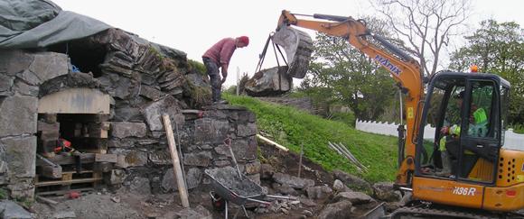 Gjenoppbygging av kjeller i Sk�lv�r.