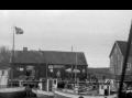 Sk�lv�r kai en gang p� 1950-tallet. Samlingen b�ter med flagg kan tyde p� at det er en kirkes�ndag. Bildet er hentet fra Facebook, og skaffet til veie av Gunnar Hall Skavoll.